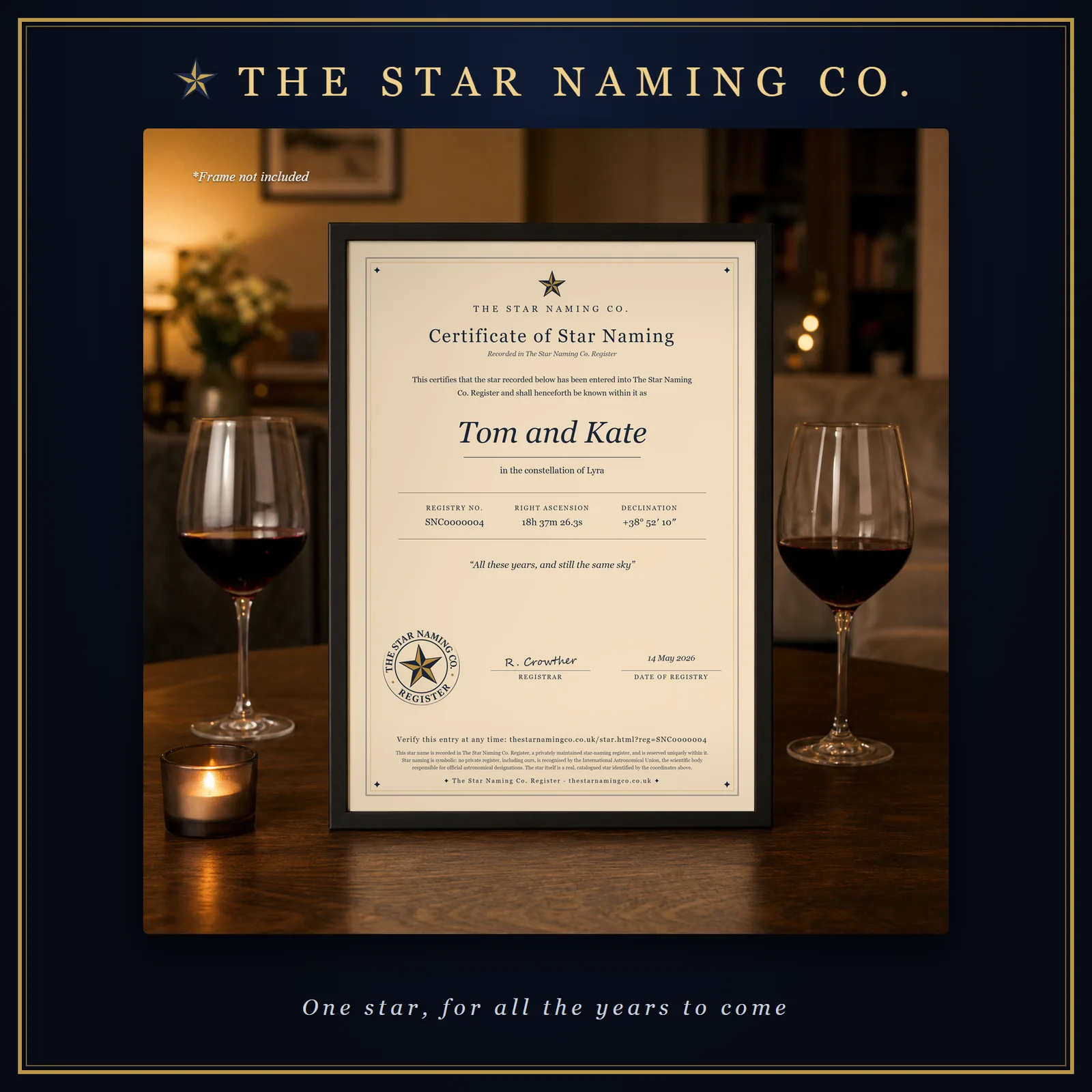A framed Certificate of Star Naming on a table set for two, in The Star Naming Co. frame.